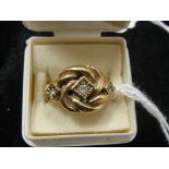 A 9ct Turkish knot ring set with spinels