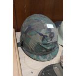 A Vietnam era hat liner & cover