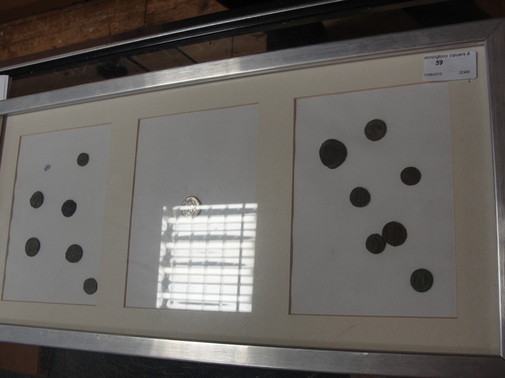 A framed quantity of Roman coins to inc a silver example