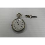 A small silver pocket watch