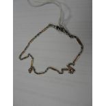 A 9ct gold and silver chain