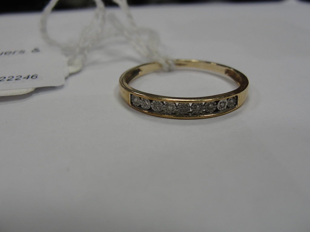 A 9ct half eternity ring