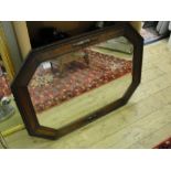 A 1920s oak framed mirror