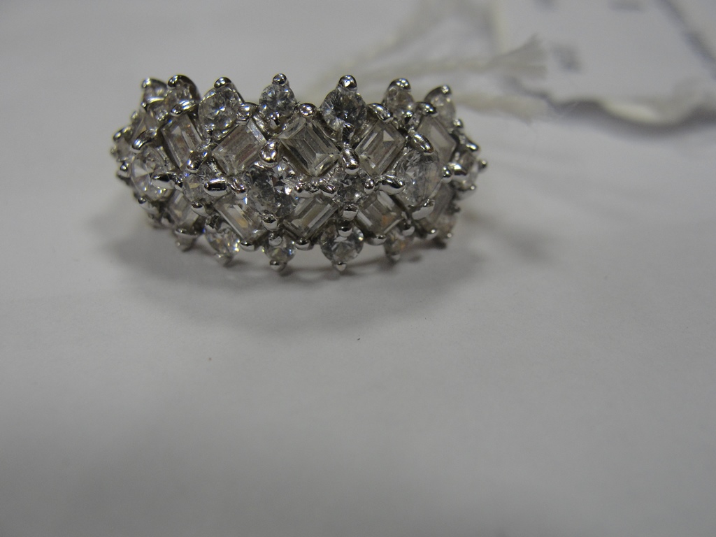 A 14k white sapphire Deco-style dress ring