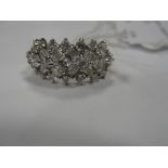 A 14k white sapphire Deco-style dress ring