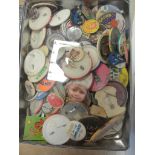 A box of badges from the 1970s and 80s