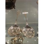 A pair of silver plated berry spoons