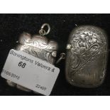 Two HM silver vesta cases