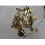 A quantity of plated pins,