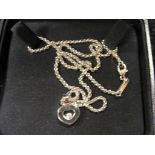 An 18ct gold Chopard Happy diamond necklace & chain with 0.