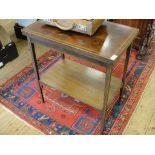 An edwardian inlaid mahogany card table