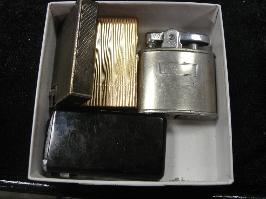 Four lighters to inc Dunhill and Ronson examples