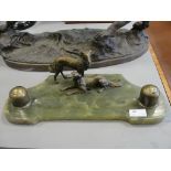 An Art Deco onyx inkstand with two hounds