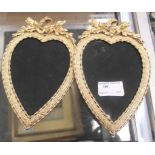 A pair of gilt heart-shaped picture frames