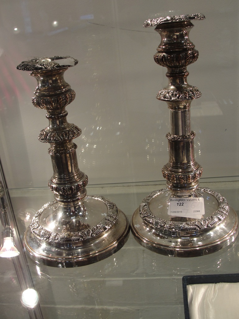 A pair of late19th century revolving/height Sheffield plate candlesticks
