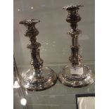 A pair of late19th century revolving/height Sheffield plate candlesticks