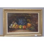 A 20th century oil on board depicting a still life of fruit