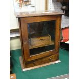 A 1930s oak smoker's chest