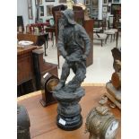 A Victorian spelter model of a fisherman