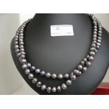 A black Tahitian pearl necklace