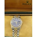 A boxed Rolex gentleman's Datejust with blue dial,