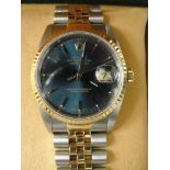 A boxed Rolex Oyster Datejust with blue dial,