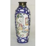 An 18th Century Chinese Famille Rose Vase:
the elongated body decorated with two medallions