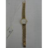 A 9ct Beuche Girod ladies gold watch on gold strap