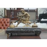 A 19th century ormolu inkstand on a marble base