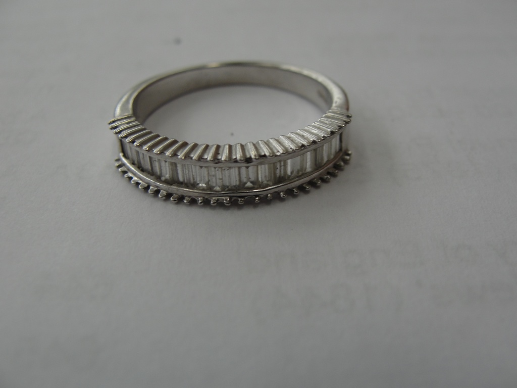 An 18ct Iliana half eternity ring set with baguette diamonds