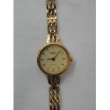 A 9ct Rotary ladies watch with 9ct strap