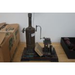 A German spirit steam engine with spare view glass by Doll & Co,