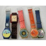 Five Swatch watches