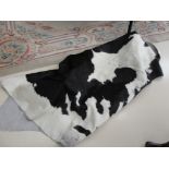 A cowhide rug