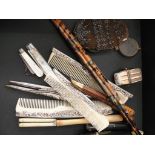 A mixed lot to inc three hallmarked silver combs, a knife in tortoiseshell holder, two fruit knives,