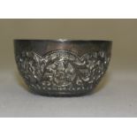 An Oomersi Mawji Silver Cup:
a simple cup with floral scrollwork and plain rim.   Marked to base 'O.