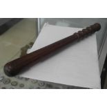 A hardwood truncheon