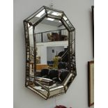 A mirror with brass inlay