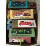 A box of boxed models of Yesteryear diecast cars