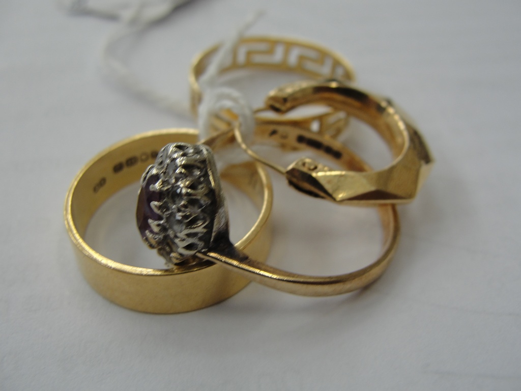 Three gold rings;