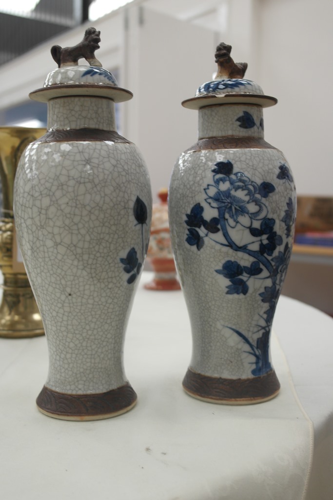 Pair of 19th century Chinese crackle glaze lidded vases