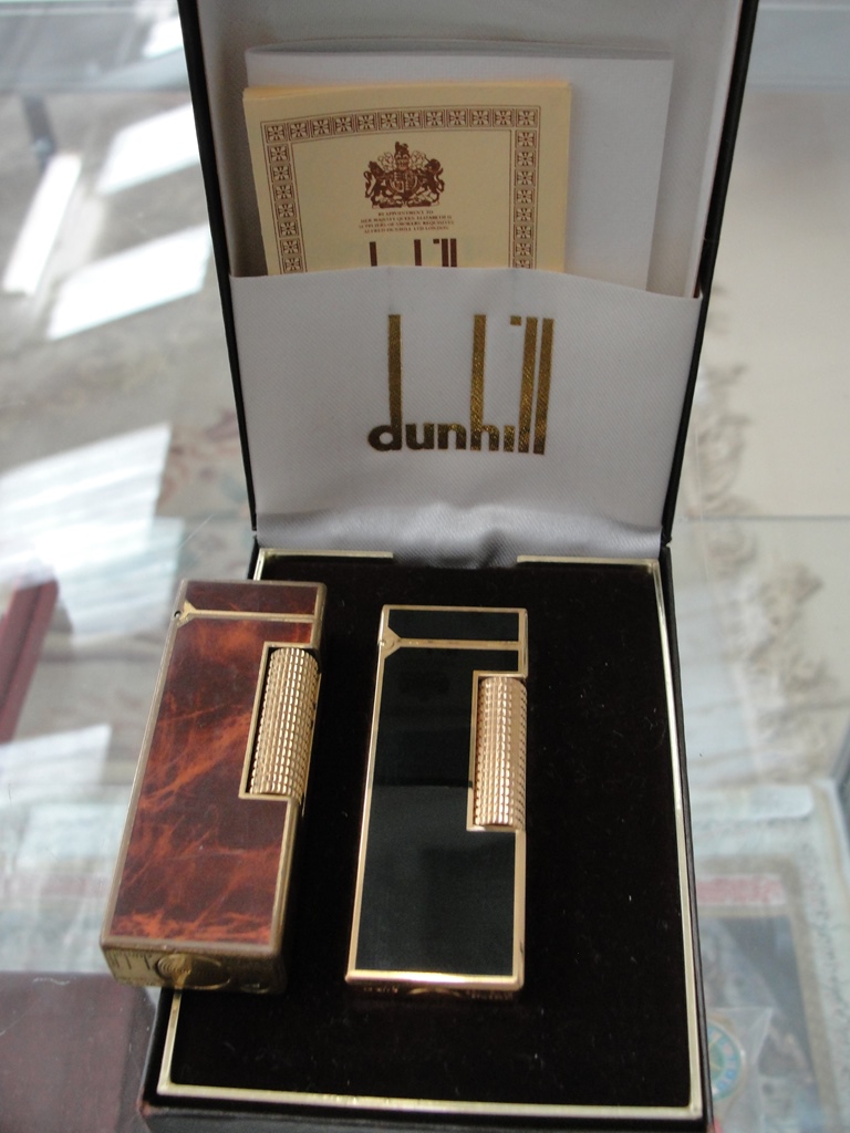 A cased Dunhill lighter;