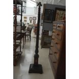 An Edwardian mahogany standard lamp