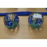 Pair of paperweights