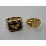 A gentleman's 18ct signet ring; together with a gentleman's 18ct silver eagle ring.