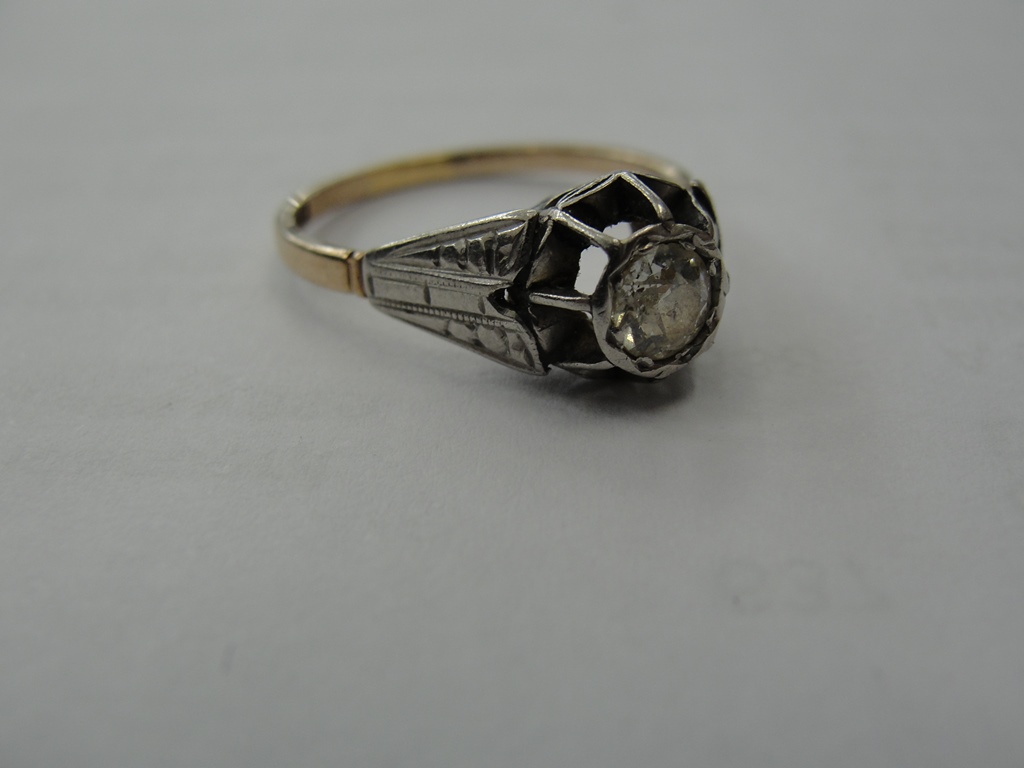 An 18ct and platinum Whitechapel mount diamond solitaire