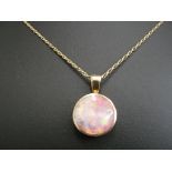 A 9ct chain and large backed opal pendant