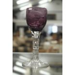 An early 19th century amethyst and clear crystal glass with faceted stem,