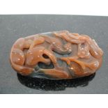 A Huang Long Pendant Carved Bi-Colour Agate with Birds on Branches