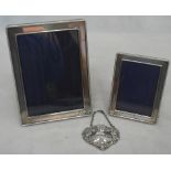 Two HM silver photograph fames;